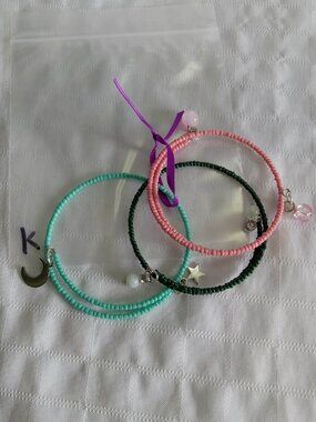 K- Handmade memory wire bracelets set with beads and pendants